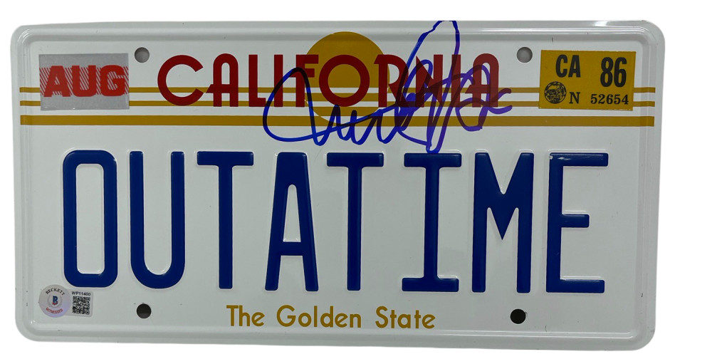 MICHAEL J FOX SIGNED BACK TO THE FUTURE OUTATIME LICENSE PLATE AUTOGRAPH BAS 29