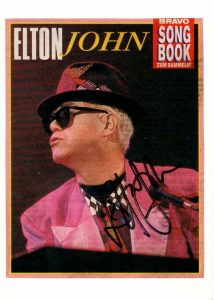 ELTON JOHN SIGNED AUTOGRAPH 4X6 BRAVO SONG BOOK CUT PHOTO – THE ROCKETMAN, REAL COLLECTIBLE MEMORABILIA