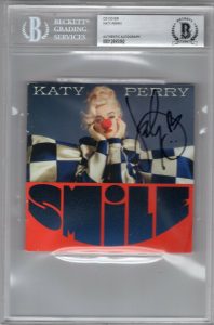 KATY PERRY SIGNED SMILE CD COVER W/BECKETT COA SLABBED AUTHENTIC BRAND NEW COLLECTIBLE MEMORABILIA