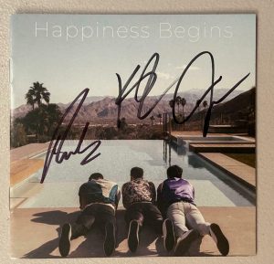 NICK JOE KEVIN JONAS BROTHERS BAND SIGNED AUTOGRAPH HAPPINESS BEGINS CD BOOKLET COLLECTIBLE MEMORABILIA