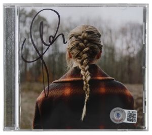 TAYLOR SWIFT AUTHENTIC SIGNED EVERMORE CD INSERT W/ DISK AUTOGRAPHED BAS COLLECTIBLE MEMORABILIA