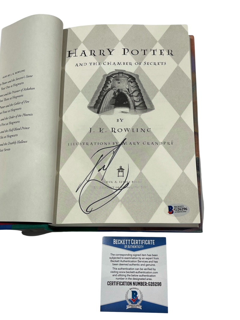 DANIEL RADCLIFFE SIGNED HARRY POTTER AND THE CHAMBER OF SECRETS BOOK BECKETT A