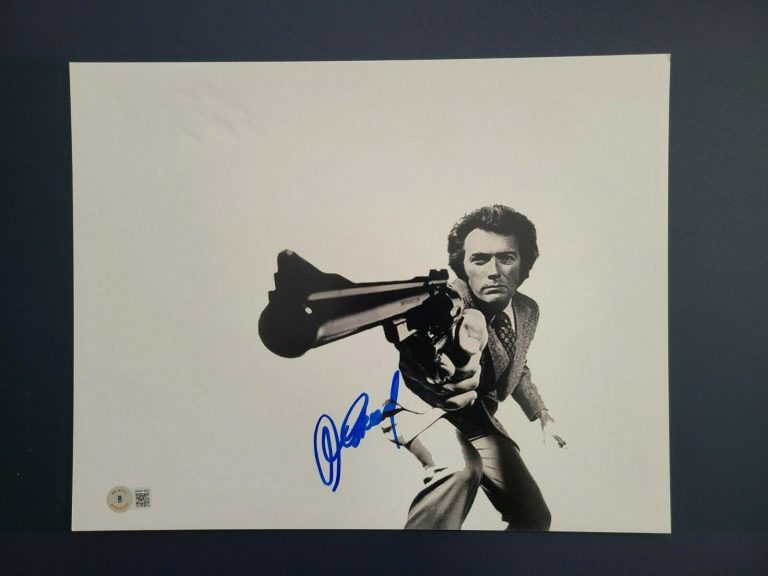CLINT EASTWOOD SIGNED 11×14 DIRTY HARRY PHOTO BECKETT BAS LOA COLLECTIBLE MEMORABILIA