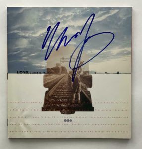 NEIL YOUNG SIGNED AUTOGRAPH LIONEL TRAINS CATALOG – BEAUTIFUL SIGNATURE W/ JSA COLLECTIBLE MEMORABILIA