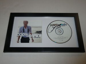 CODY SIMPSON SIGNED FRAMED “PREVIEW TO PARADISE” CD HEARTTHROB RARE COLLECTIBLE MEMORABILIA