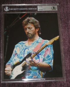 ERIC CLAPTON SIGNED 8 X 10 CONCERT PHOTO BECKETT AUTHENTICATED & ENCAPSULATED COLLECTIBLE MEMORABILIA