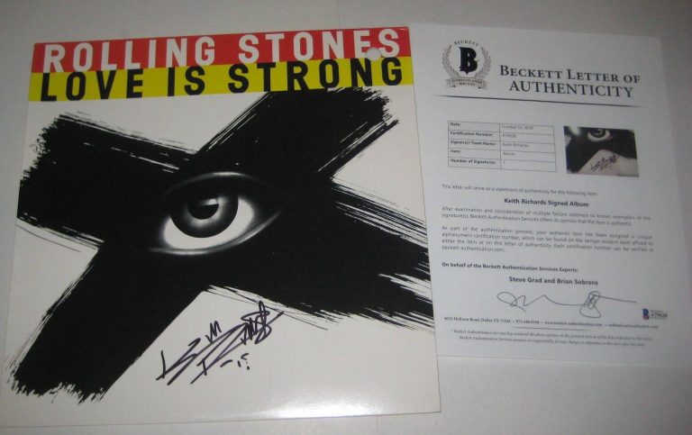 KEITH RICHARDS (ROLLING STONES) SIGNED LOVE IS STRONG LP COVER W/ BECKETT LOA COLLECTIBLE MEMORABILIA