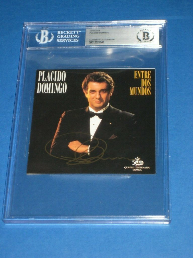 PLACIDO DOMINGO SIGNED ENTRE DOS MUNDOS CD BECKETT AUTHENTICATED & ENCAPSULATED COLLECTIBLE MEMORABILIA