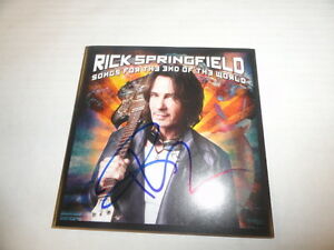 RICK SPRINGFIELD SIGNED “SONGS FOR THE END OF THE WORLD” NEW CD COVER PROOF COLLECTIBLE MEMORABILIA