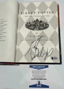 DANIEL RADCLIFFE SIGNED HARRY POTTER AND THE SORCERER’S STONE BOOK BECKETT 3 COLLECTIBLE MEMORABILIA