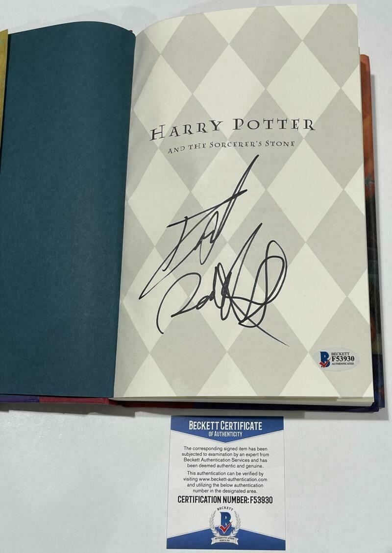 DANIEL RADCLIFFE SIGNED HARRY POTTER AND THE SORCERER'S STONE BOOK BECKETT 30