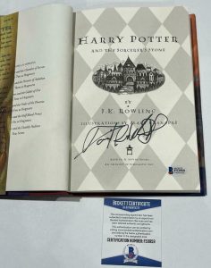 DANIEL RADCLIFFE SIGNED HARRY POTTER AND THE SORCERER’S STONE BOOK BECKETT 38 COLLECTIBLE MEMORABILIA