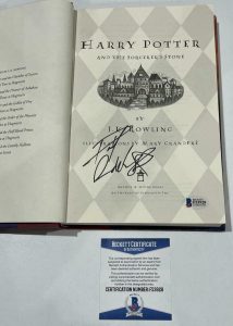 DANIEL RADCLIFFE SIGNED HARRY POTTER AND THE SORCERER’S STONE BOOK BECKETT 42 COLLECTIBLE MEMORABILIA