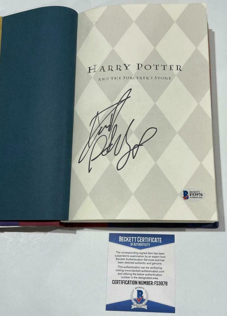 DANIEL RADCLIFFE SIGNED HARRY POTTER AND THE SORCERER’S STONE BOOK BECKETT 45 COLLECTIBLE MEMORABILIA