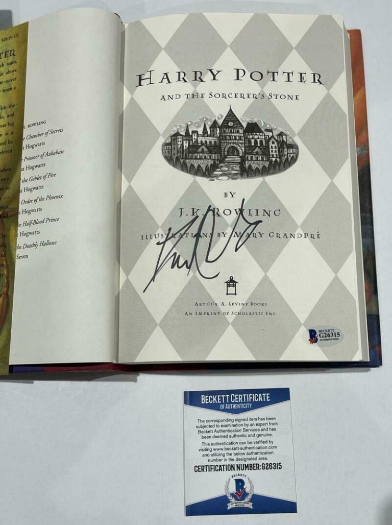 DANIEL RADCLIFFE SIGNED HARRY POTTER AND THE SORCERER’S STONE BOOK BECKETT 65 COLLECTIBLE MEMORABILIA