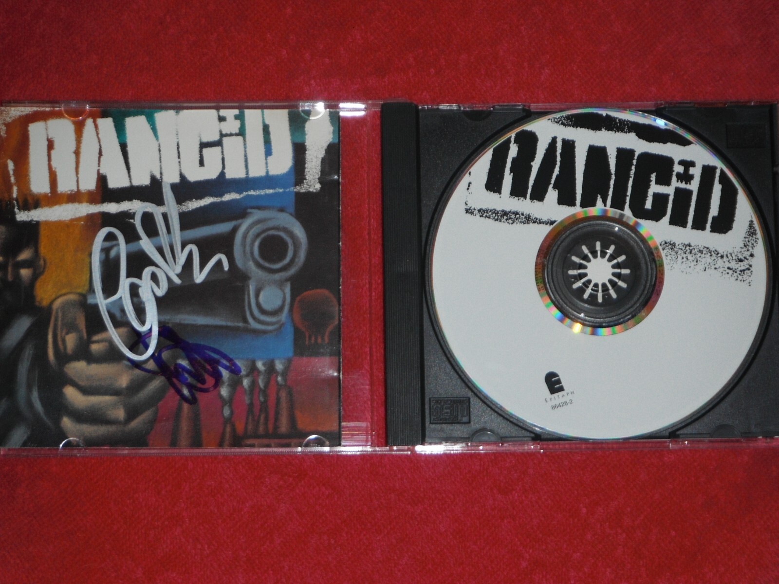 RANCID SIGNED CD COVER LARS & TIM