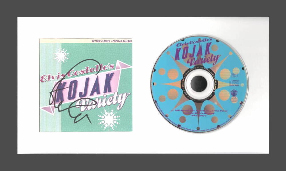 ELVIS COSTELLO SIGNED AUTOGRAPH KOJAK VARIETY FRAMED CD DISPLAY - READY TO HANG!