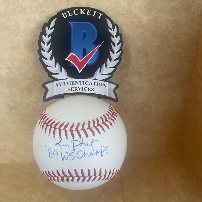 KEN PHELPS 89 WS CHAMPS SIGNED AUTOGRAPHED M.L. BASEBALL AUTHENTICATED