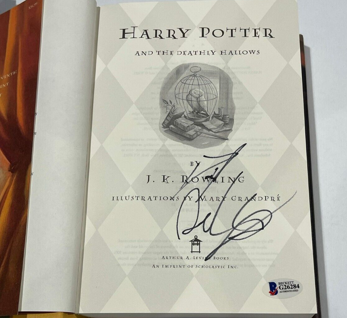 DANIEL RADCLIFFE SIGNED HARRY POTTER AND THE DEATHLY HALLOWS BOOK BECKETT 1