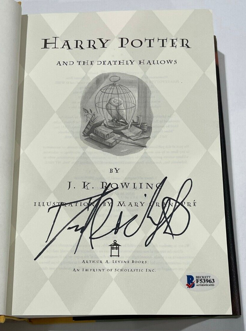 DANIEL RADCLIFFE SIGNED HARRY POTTER AND THE DEATHLY HALLOWS BOOK BECKETT 11