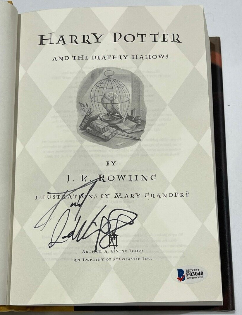 DANIEL RADCLIFFE SIGNED HARRY POTTER AND THE DEATHLY HALLOWS BOOK BECKETT 13