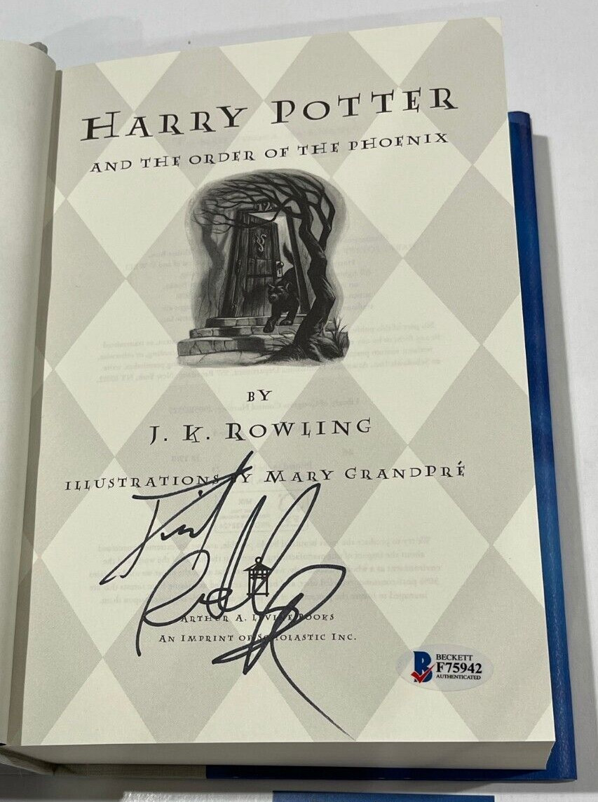 DANIEL RADCLIFFE SIGNED HARRY POTTER AND THE ORDER OF THE PHOENIX BOOK BECKETT 1