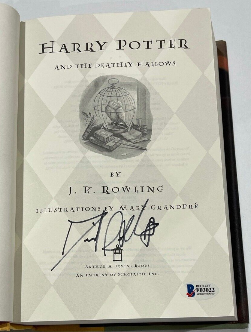 DANIEL RADCLIFFE SIGNED HARRY POTTER AND THE DEATHLY HALLOWS BOOK BECKETT 4