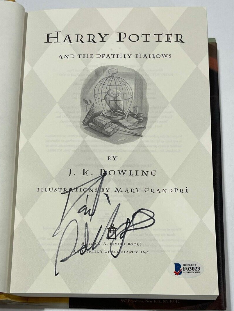 DANIEL RADCLIFFE SIGNED HARRY POTTER AND THE DEATHLY HALLOWS BOOK BECKETT 9