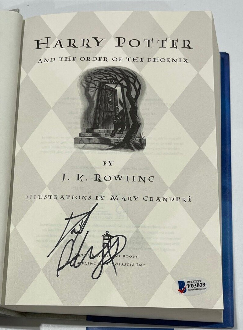 DANIEL RADCLIFFE SIGNED HARRY POTTER AND THE ORDER OF THE PHOENIX BOOK BECKETT 7