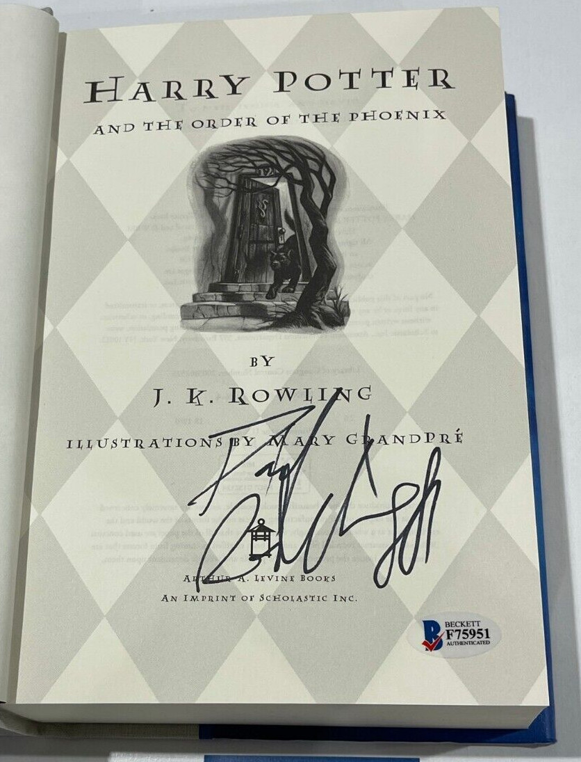 DANIEL RADCLIFFE SIGNED HARRY POTTER AND THE ORDER OF THE PHOENIX BOOK BECKETT A