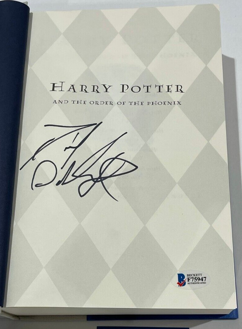 DANIEL RADCLIFFE SIGNED HARRY POTTER AND THE ORDER OF THE PHOENIX BOOK BECKETT B