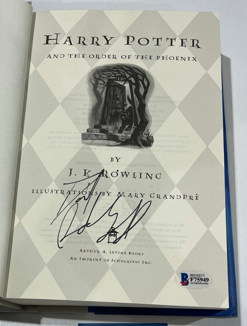 DANIEL RADCLIFFE SIGNED HARRY POTTER AND THE ORDER OF THE PHOENIX BOOK BECKETT C