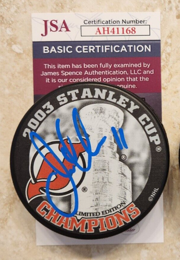 John Madden Signed 2003 Stanley Cup Champions Puck w/ JSA COA #AH41168 NJ Devils