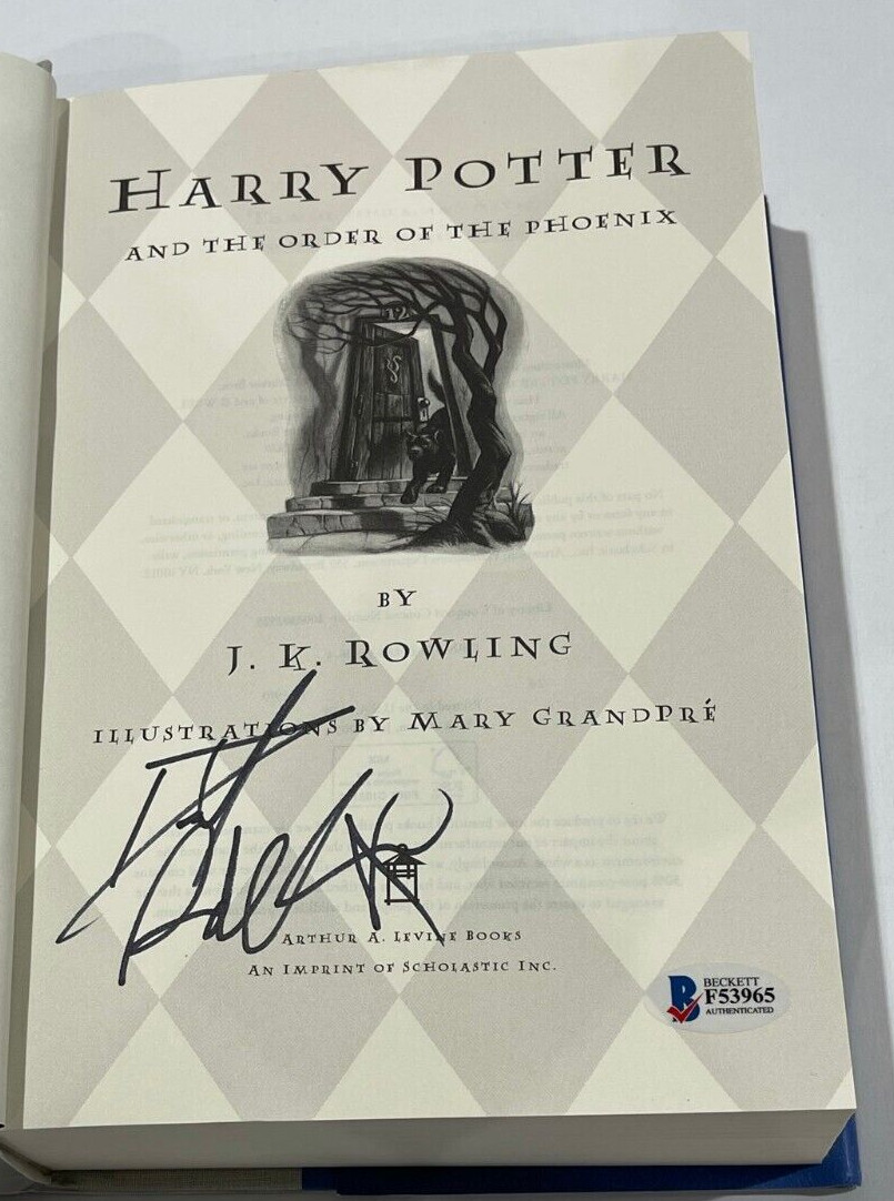 DANIEL RADCLIFFE SIGNED HARRY POTTER AND THE ORDER OF THE PHOENIX BOOK BECKETT F