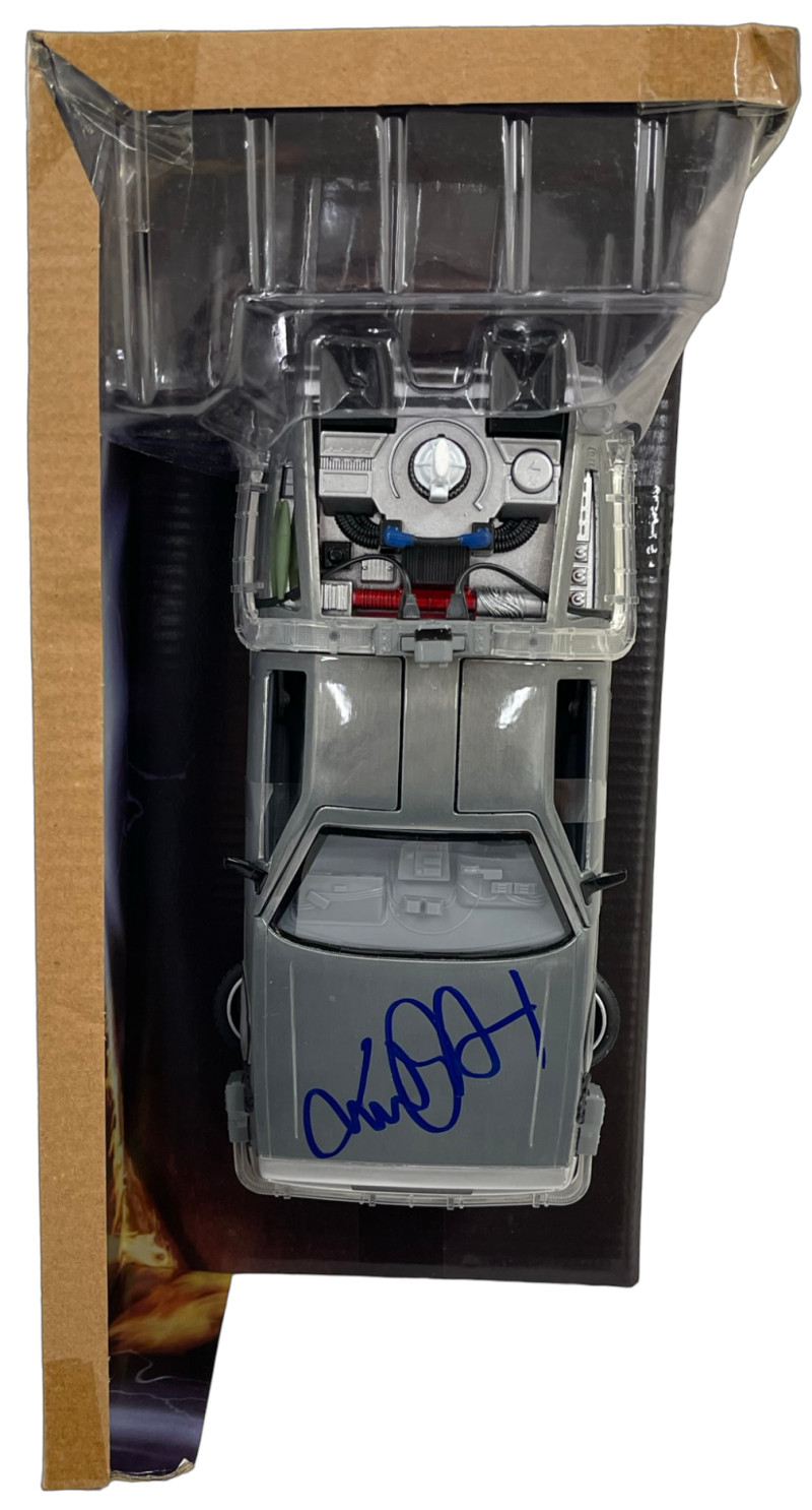 MICHAEL J FOX SIGNED BACK TO THE FUTURE 1:24 DELOREAN DIECAST BECKETT COA
