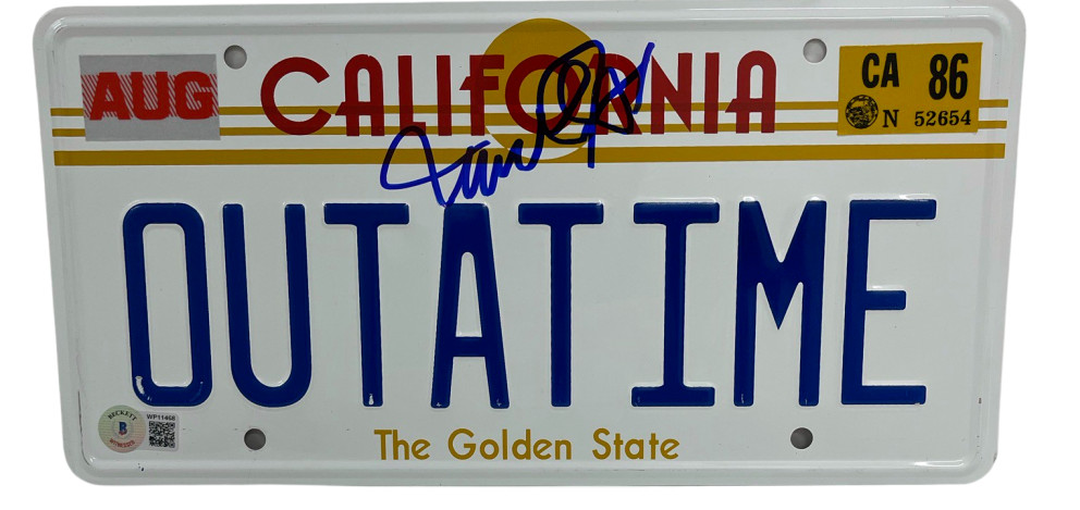 MICHAEL J FOX SIGNED BACK TO THE FUTURE OUTATIME LICENSE PLATE AUTOGRAPH BAS 34
