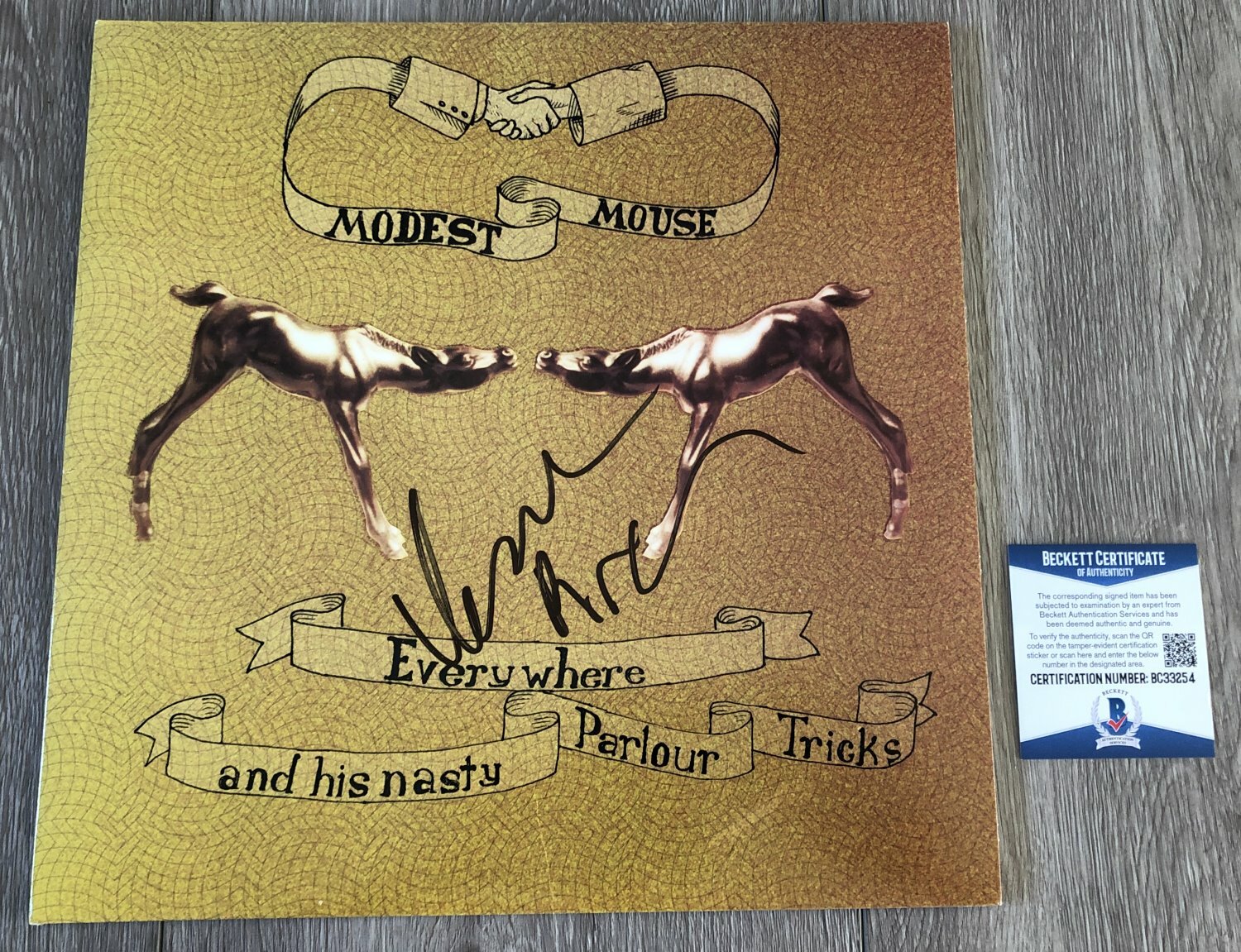 ISAAC BROCK SIGNED MODEST MOUSE NASTY PARLOUR TRICKS VINYL & BECKETT BAS COA
