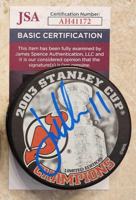 John Madden Signed 2003 Stanley Cup Champions Puck w/ JSA COA #AH41172 NJ Devils