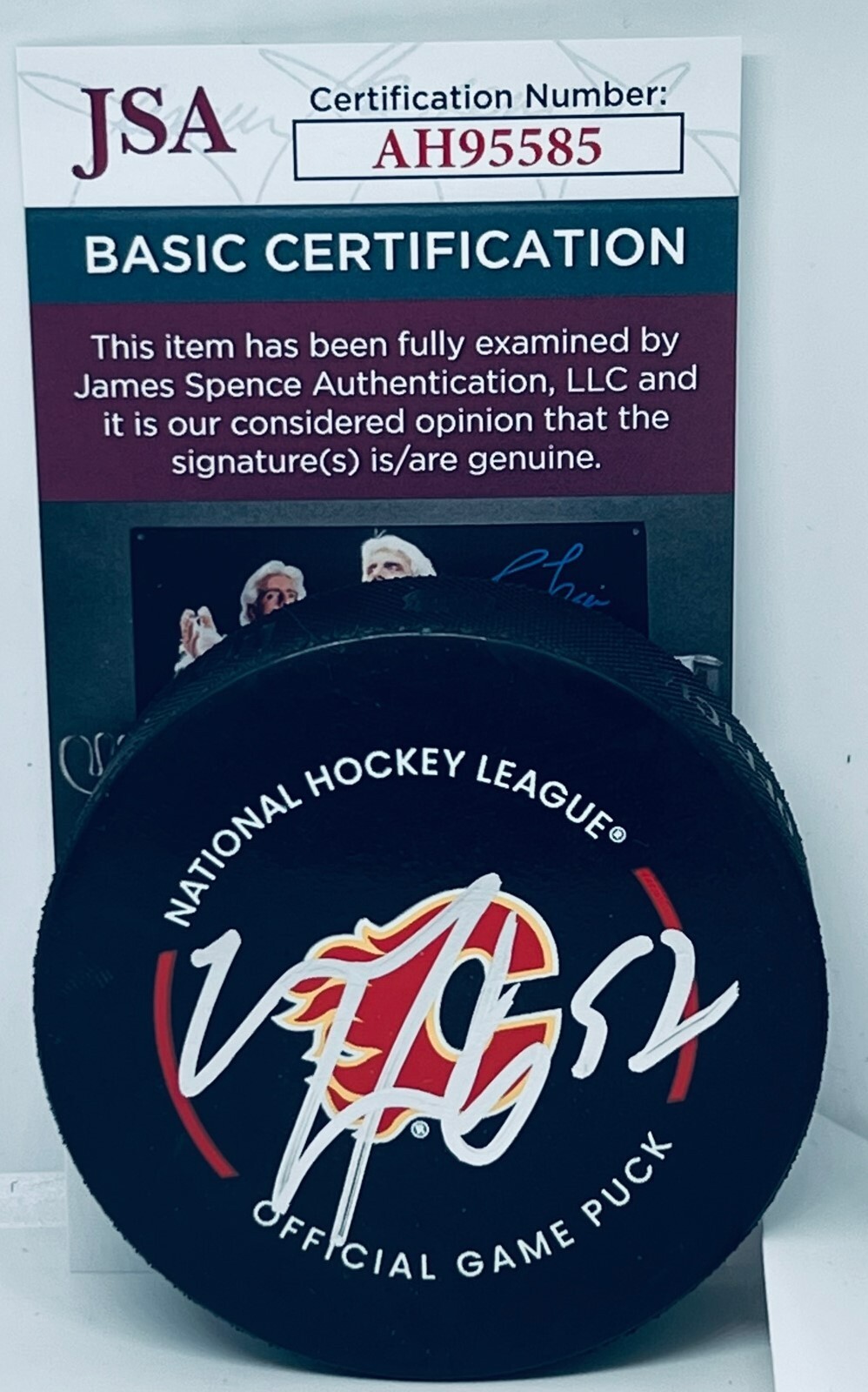 MacKenzie Weegar signed Calgary Flames Official Game Puck autographed JSA
