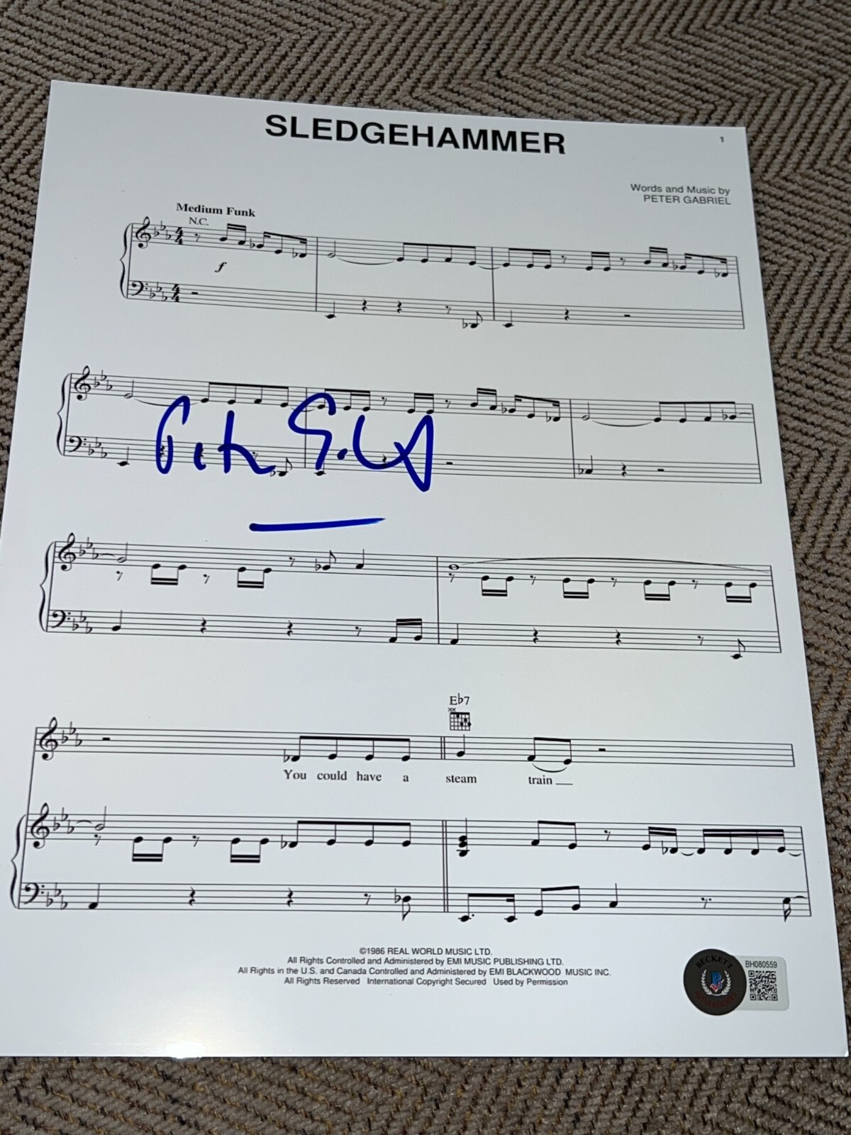 PETER GABRIEL SIGNED AUTOGRAPH SHEET MUSIC SLEDGEHAMMER BECKETT BAS COA AUTO X1