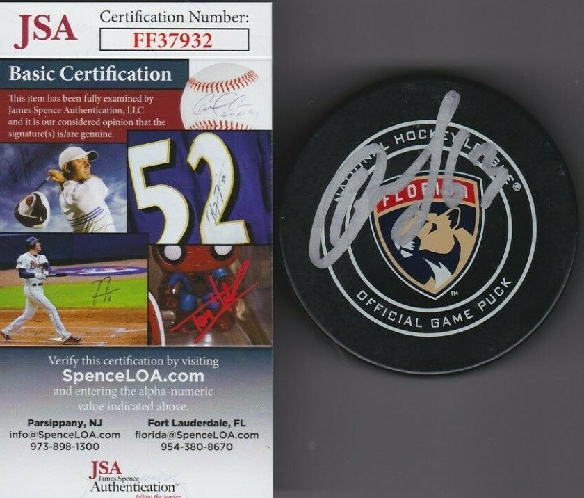 Evgenii Dadonov Signed Official NHL Game Puck JSA COA #FF37932 Florida Panthers