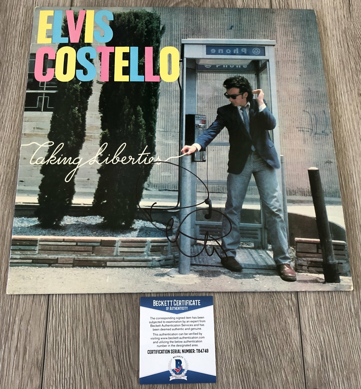ELVIS COSTELLO SIGNED TAKING LIBERTIES VINYL ALBUM w/PROOF & BECKETT BAS COA
