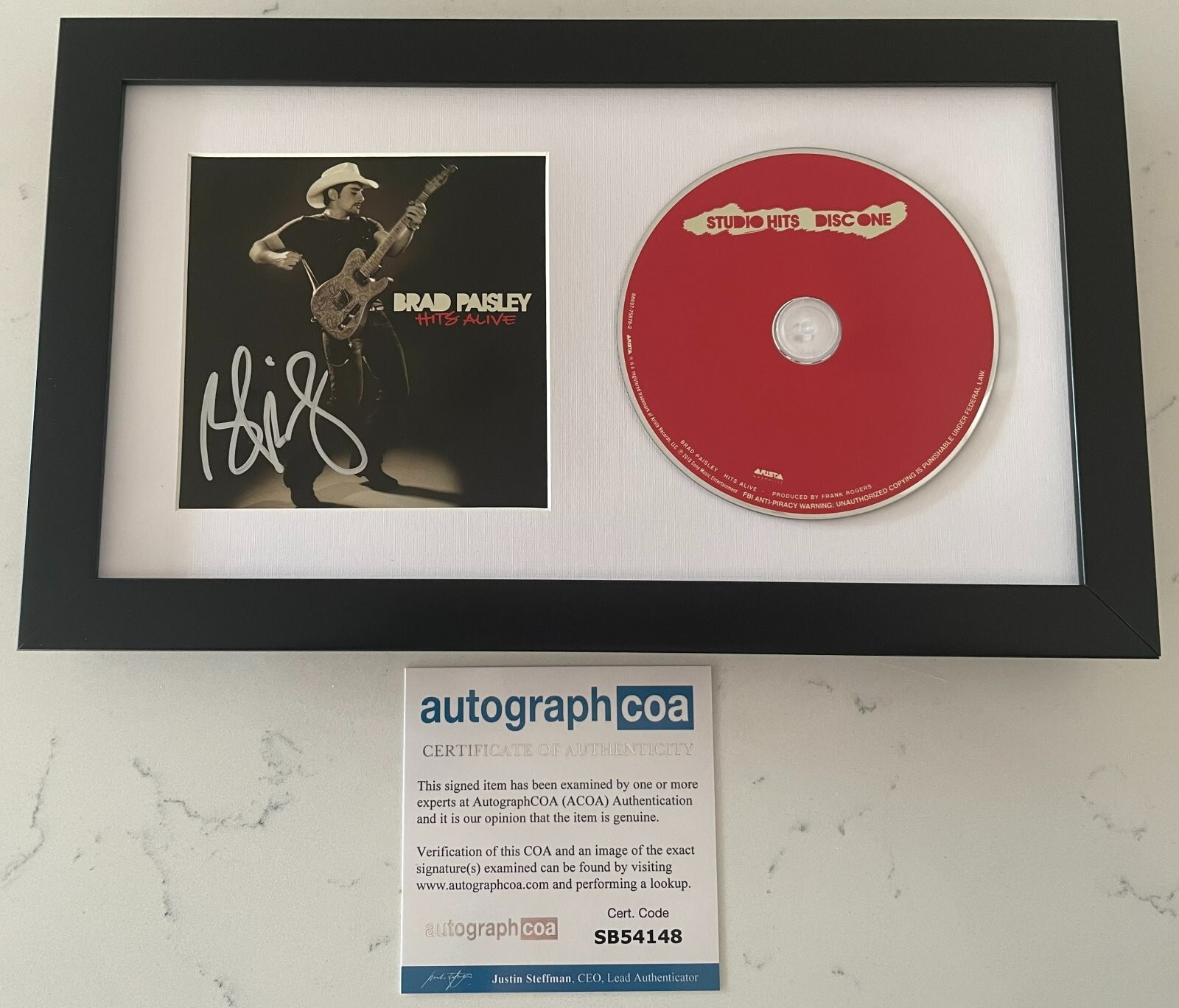 BRAD PAISLEY SIGNED HITS ALIVE FRAMED & MATTED CD w/ AUTOGRAPH ACOA COA
