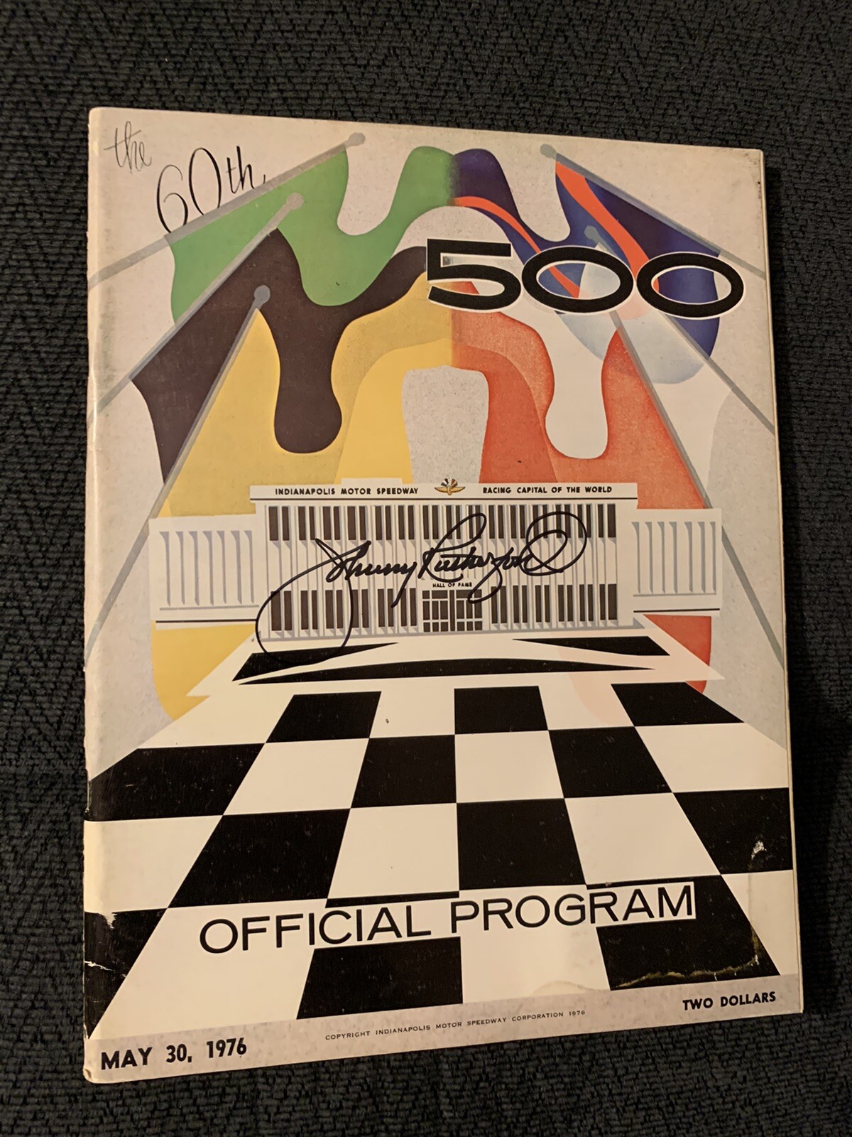 1976 INDY 500 PROGRAM SIGNED BY WINNER JOHNNY RUTHERFORD AUTOGRAPHED COLLECTIBLE MEMORABILIA