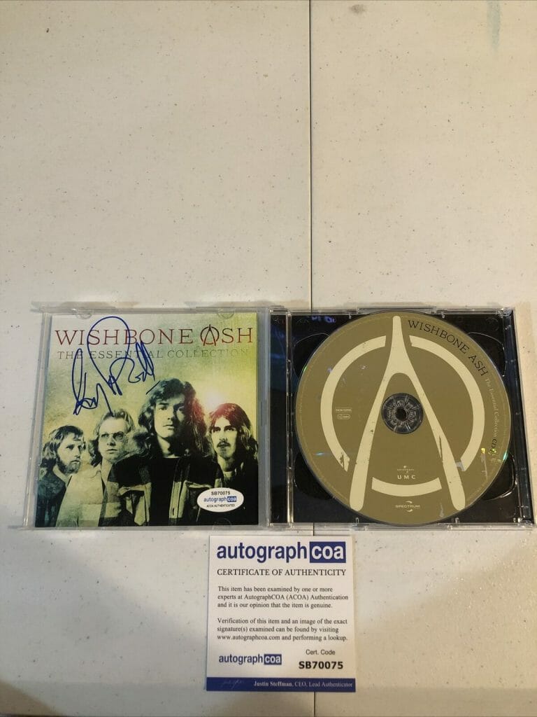 ANDY POWELL WISHBONE ASH SIGNED AUTOGRAPH CD ACOA THE ESSENTIAL COLLECTION COLLECTIBLE MEMORABILIA
