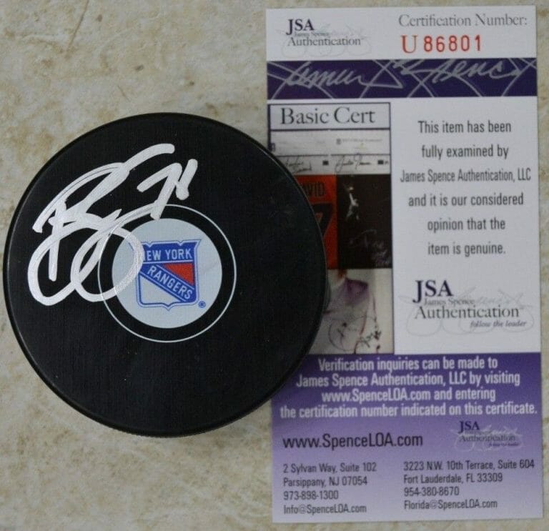 BRADY SKJEI SIGNED PUCK W/ JSA COA #U86801 NEW YORK RANGERS NY COLLECTIBLE MEMORABILIA