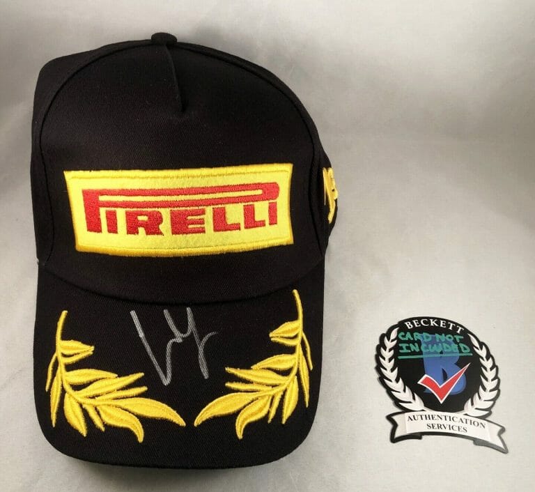 CARLOS SAINZ SIGNED HAT BECKETT BAS PIRELLI PODIUM FORMULA 1 F1 FERRARI 1 COA COLLECTIBLE MEMORABILIA