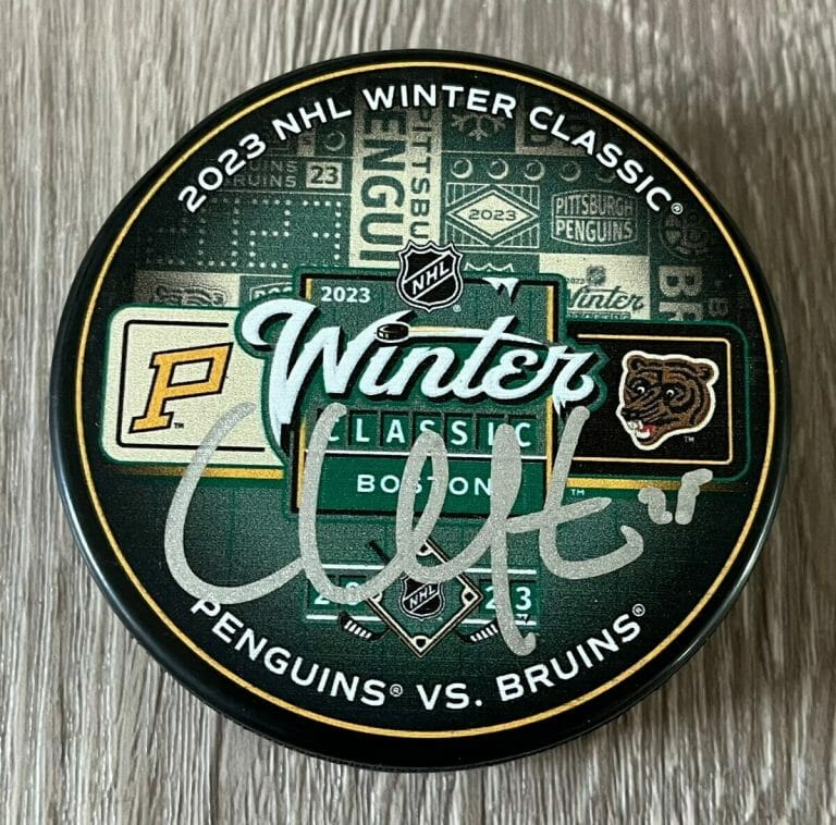 CONNOR CLIFTON SIGNED AUTOGRAPH BOSTON BRUINS 2023 WINTER CLASSIC PUCK W/PROOF
 COLLECTIBLE MEMORABILIA