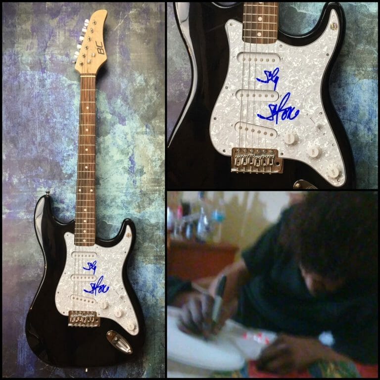 GFA SLY AND THE FAMILY STONE * SLY STONE * SIGNED ELECTRIC GUITAR PROOF AD2 COA COLLECTIBLE MEMORABILIA