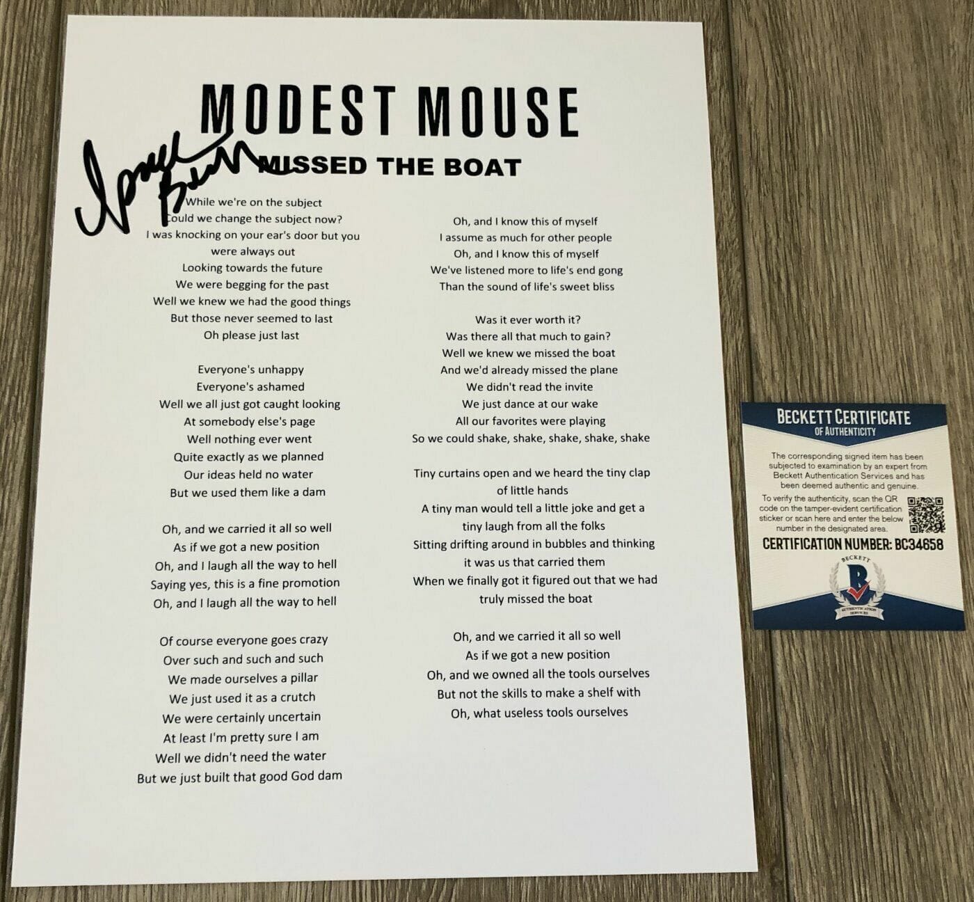 ISAAC BROCK SIGNED MODEST MOUSE MISSED THE BOAT LYRIC SHEET w/PROOF BECKETT COA